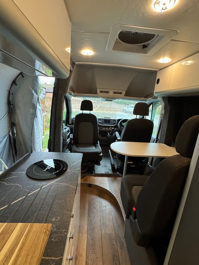 Finished camper van cabin and kitchen